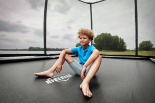 Trampolin BERG Ultim Elite FlatGround 500 + Sicherheitsnetz DLX XL